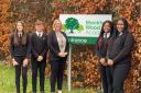 Monkton Wood Academy principal Hannah Jones unveils the new name and logo with students Maisie Durman, Noah Day-Hitchen, Bethel Chitambira and Aretha Agere. Picture: Monkton Wood Academy