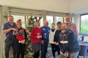 The golfers donned Christmas jumpers last week