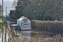 An Arla milk tanker is stuck in floodwater near Yeovil.