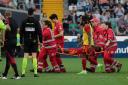 Roma’s Evan Ndicka is carried from the pitch on a stretcher (Andrea Bressanutti/AP/PA)