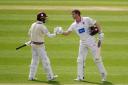 Somerset's Tom Lammonby (right) celebrates his century with team mate Lewis Goldsworthy against Surrey at the Kia Oval.