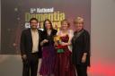 At the Dementia Care Awards, from left, are ITV’s Paul Sinha, Fiona Mahoney and Emma Green of Reminiscence Learning, and Sue McLean, director of Care Services and Outcomes at Community Integrated Care.