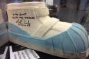 MOON WALK: A replica moon boot signed by the Apollo-16 astronaut Charlie Duke. Picture SWNS