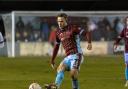 Ollie Chamberlain on the ball for Taunton Town FC.