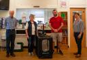 Brian Blelloch Treasurer to The League of Friends of Wellington Hospital and Chair Annette Cardwell hand over the 3D printer to Court Fields Head of Design Technology Ian Keitch and Acting Headteacher Polly Matthews.