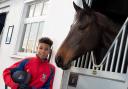 Rupert Hyde is hoping to be the Lewis Hamilton of the show jumping world and inspire other BAME people to take up the sport. Street, Somerset. See SWNS story SWBRhorse. A stage director is living in a tent in his garden to ensure his theatre company can