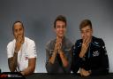 MIXED FORTUNES: Lando Norris (centre) with race winner Lewis Hamilton (left) and George Russell (right), who also suffered a puncture (Image: David Davies, PA Wire, July 11, 2019)