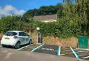 An electric vehicle charging point has been placed in the medieval village of Dunster in Somerset.