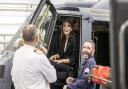 The Princess of Wales jokes with navy personnel as she sits in a training version of a Royal Navy Wildcat helicopter during a visit to the Royal Naval Air Station (RNAS) Yeovilton.