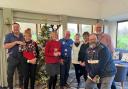 The golfers donned Christmas jumpers last week