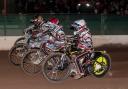 LEVEL-PEGGING: The riders head into the first bend in Heat 4   Photo: Colin Burnett