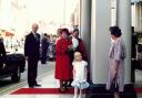 PRESENTATION: Five-year-old Nicola Quinn handed the Queen a posy
