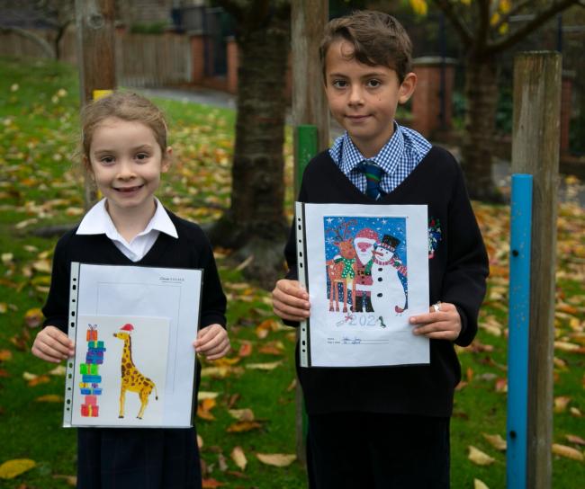 DESIGNERS: Emily, 6, and Sebbie, 10, created Christmas cards for Clarks