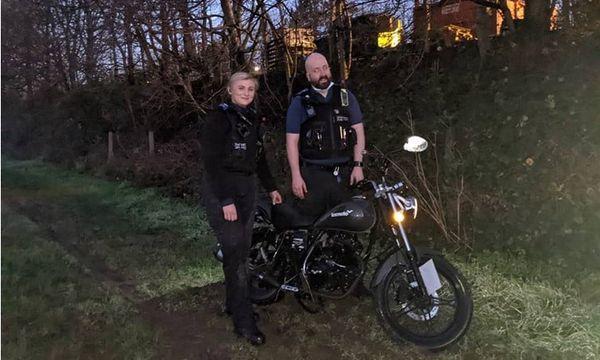 Officers with the recovered motorbike. Image: Avon and Somerset Police