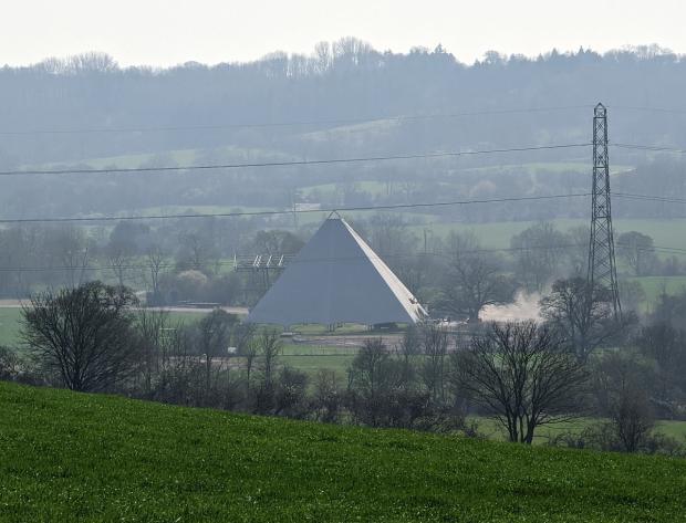 Somerset County Gazette: The covers have started going on Glastonbury's Pyramid Stage ready for June. Picture: Newsquest