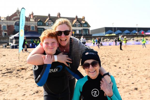Somerset County Gazette: Theo Spreadbury, Emma Hooper, and Iris Hooper braved the Bristol Channel on Saturday to raise money for St Margaret's Hospice. Pictures: Steve Richardson