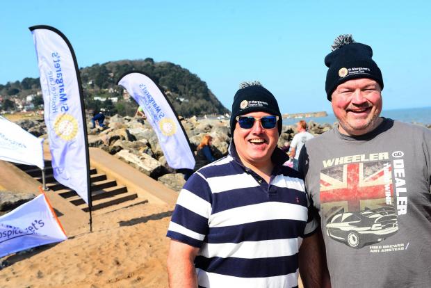 Somerset County Gazette: Gilles Irwin and Clem Woodward were among the charity's supporters enjoying the sunshine before braving the icy water.
