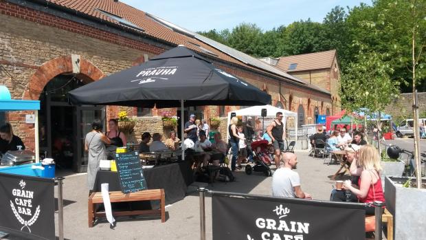 Somerset County Gazette: Crowds at the Cheese & Grain's café/bar. Picture: Frome Cheese & Grain