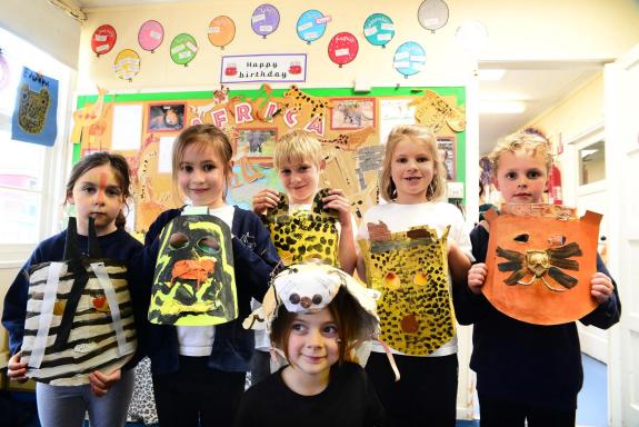 Somerset County Gazette: Children from Hedgehog Class pose in front of their Africa display. Somerset County Gazette: Children from Hedgehog Class pose in front of their Africa display.