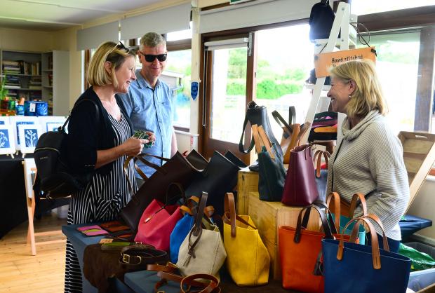 Somerset County Gazette: Visitors admire a range of hand-stitched bags.