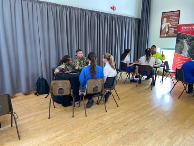 Somerset County Gazette: Two pupils hear from army personnel about life in the military. Picture: Danesfield Church of England School