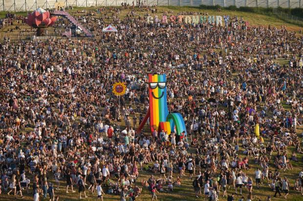 Somerset County Gazette: Glastonbury attendees enjoyed warm weather on the first day of the event (PA)