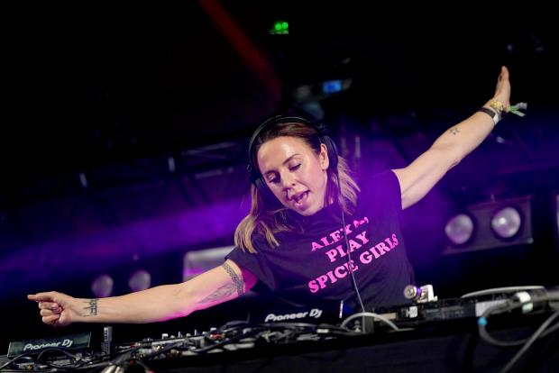 Somerset County Gazette: Melanie C entertained the William's Green crowd with a DJ set before Eavis and Bastille's performances. Picture: Yui Mok, PA Wire