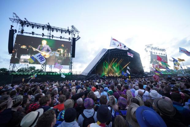 Somerset County Gazette: A photo showing the crowd at the Pyramid Stage during Sir Paul McCartney set (PA Wire/PA Images. Photo by Yui Mok)