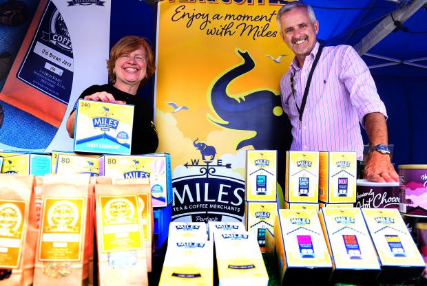 Somerset County Gazette: Quantock Brewery managing director Cheryl Ford with Mr Miles owner Colin Barrell. Picture: Steve Richardson