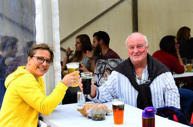 Somerset County Gazette: Sonya Drees and Dave Hawkins with their beverages at Beerfest.