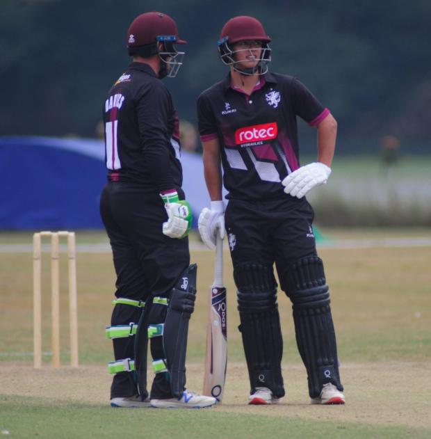 Somerset County Gazette: Josh Thomas with Steve Davies in Truro. Picture: Somerset County Cricket Club