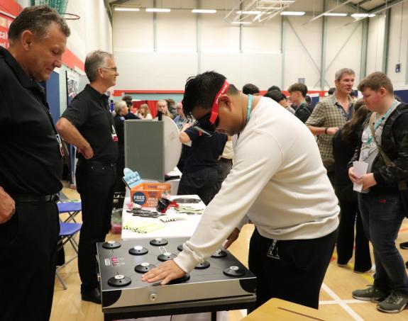Somerset County Gazette: James Zhou tests his reflexes while wearing 'beer goggles'. Picture: Strode College Somerset County Gazette: James Zhou tests his reflexes while wearing 'beer goggles'. Picture: Strode College