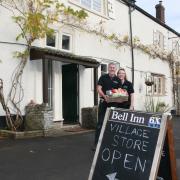 Emma and John Hitchins celebrate the opening of the village store at The Bell Inn, Leigh-on-Mendip