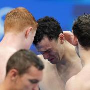 EMOTIONAL: Great Britain's James Guy (centre) and Tom Dean celebrate gold in the Men's 4x200 freestyle relay at the Tokyo 2020 Olympic Games (pic: Joe Giddens/PA Wire)