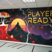 PLAYER READY: A feature wall at the VR venue was designed and created by a local artist, Sam from Aerosol Art