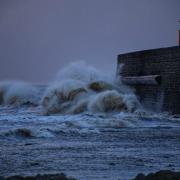 STORM EUNICE: Waves batter the shore in Watchet (Image: Ben Turley Photography, Somerset Camera Club)
