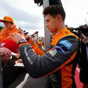 Lando Norris signs autographs after the Emilia Romagna Grand Prix last month. Picture: David Davies, PA Wire