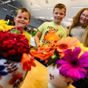 Wellington Flower Show ; Dexter, Zachary and Emilia Barrett with some of their show entries.