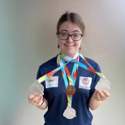 Caroline Faithful with her medals.