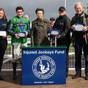 HRH The Princes Royal makes the presentations to  connections of Donnie Azoff who won the second race - including jockey Gavin Sheehan, who rode a double on the day.