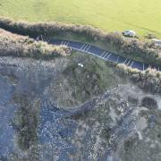 Cleeve Hill, where the road is permanently closed due to coastal erosion. Picture: Geckoella