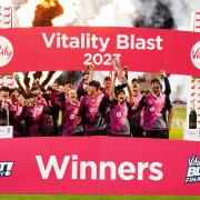 Somerset players lift the Vitality Blast trophy in July 2023.