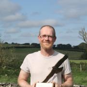 Nathan Orr, Mendip Hills AONB Nature Recovery Ranger, with the Bowland Award.