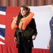 The Princess of Wales laughed after inflating a military life jacket at RNAS Yeovilton.