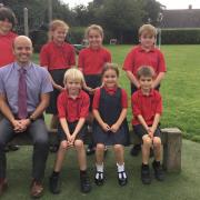 Barney Rycroft and some of the pupils at Stoke St Gregory CofE Primary School, where he is the new headteacher. Picture: Stoke St Gregory CofE Primary School