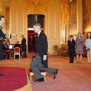 Sir Jacob Rees-Mogg is knighted by the Princess Royal at Windsor Castle.