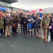 Happy members of the David Pipe Racing Club pictured with Red Happy and jockey Jack Tudor in the winners enclosure at Exeter last week.