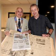 Taunton Castle Probus club President Geoffrey Morton and Somerset County Gazette editor Tim Lethaby with an up to date copy of a tabloid County Gazette and a black and white broadsheet Gazette from 50 years ago