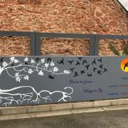 The mural was donated by local artist Christine Sowden