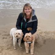 Nicky Fox with her two dogs, with Milo on the left